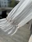 Beige silkekjole thumbnail